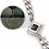 Macro view of the Nano Bible Bracelet pendant with magnified inset of the nano chip showing the microscopic Hebrew Tanakh text inside the square sterling silver frame