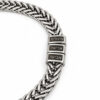 Close up of three Hebrew names engraved on stainless steel beads of a dad name bracelet